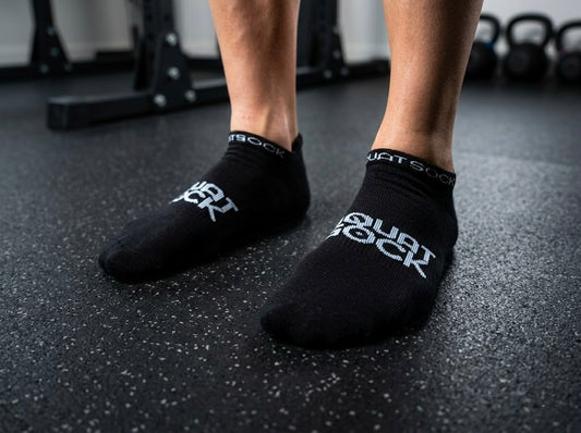 The SquatSock® has gripped bottoms for gym or home use.