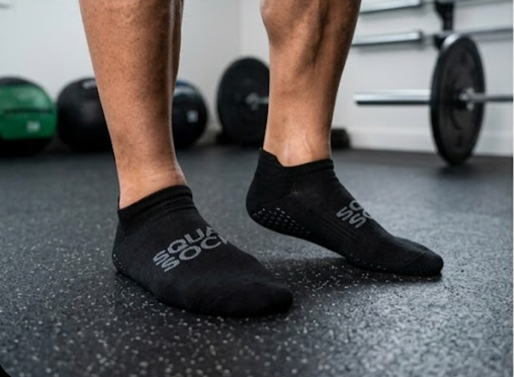 The SquatSock® has gripped bottoms for gym or home use.